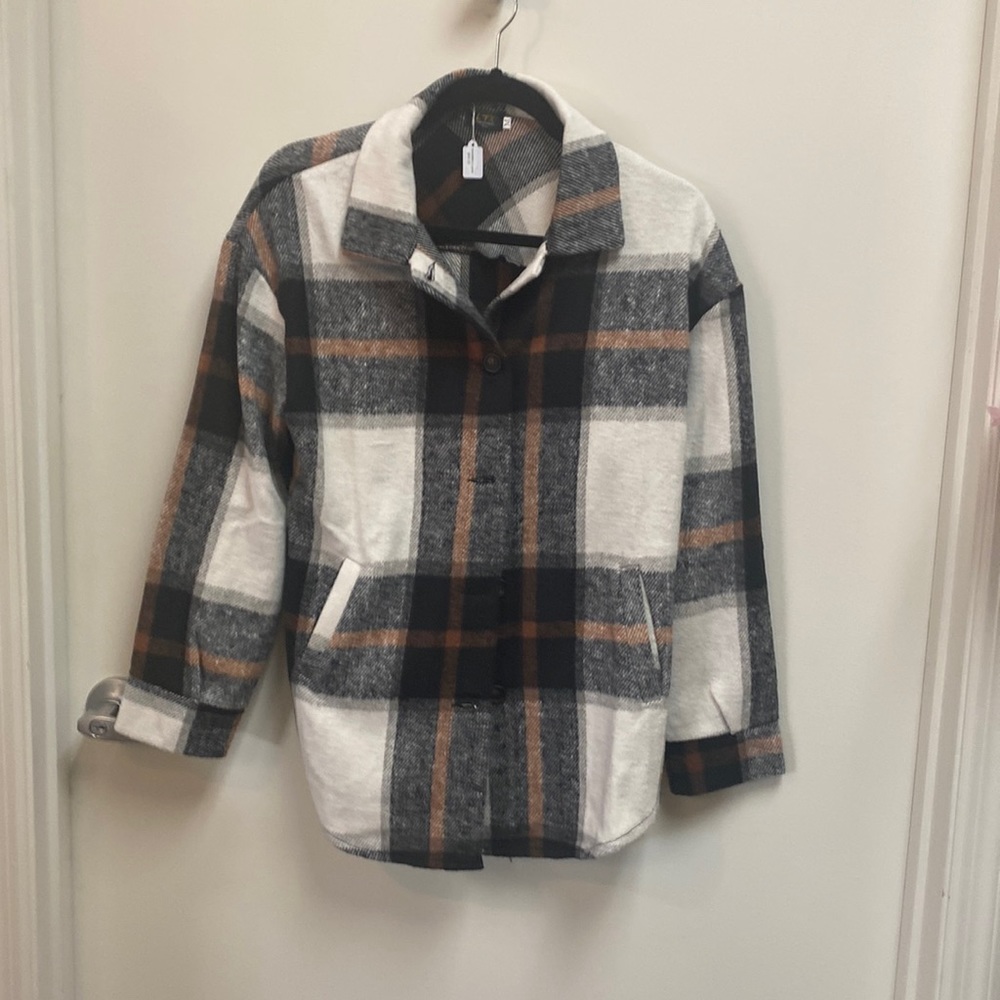 Black, cream and brown jacket. Button front with pockets by LTX.